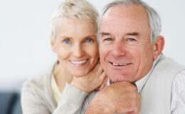 Charming old couple smiling together